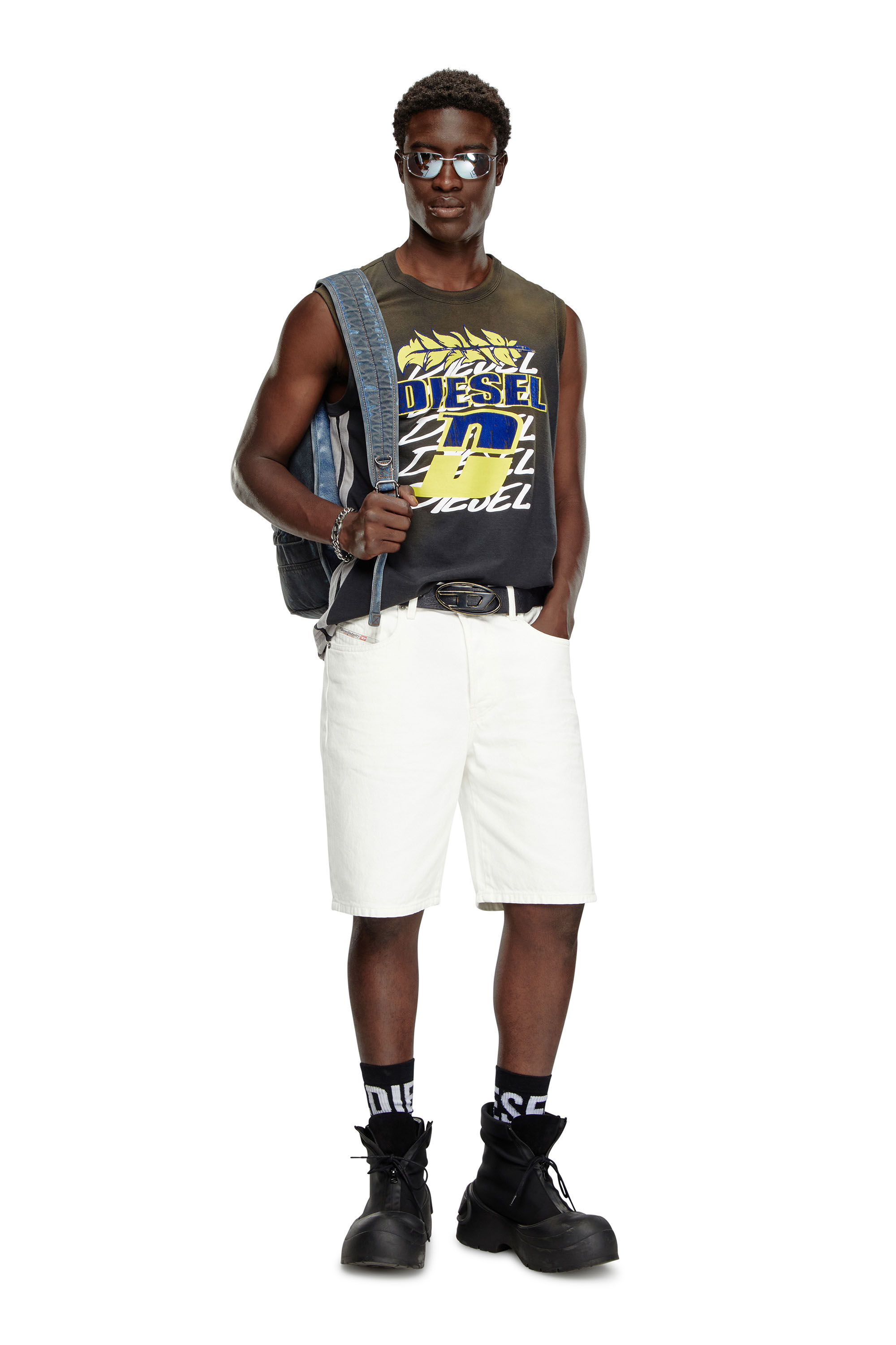 Man wearing short jean shorts on sale