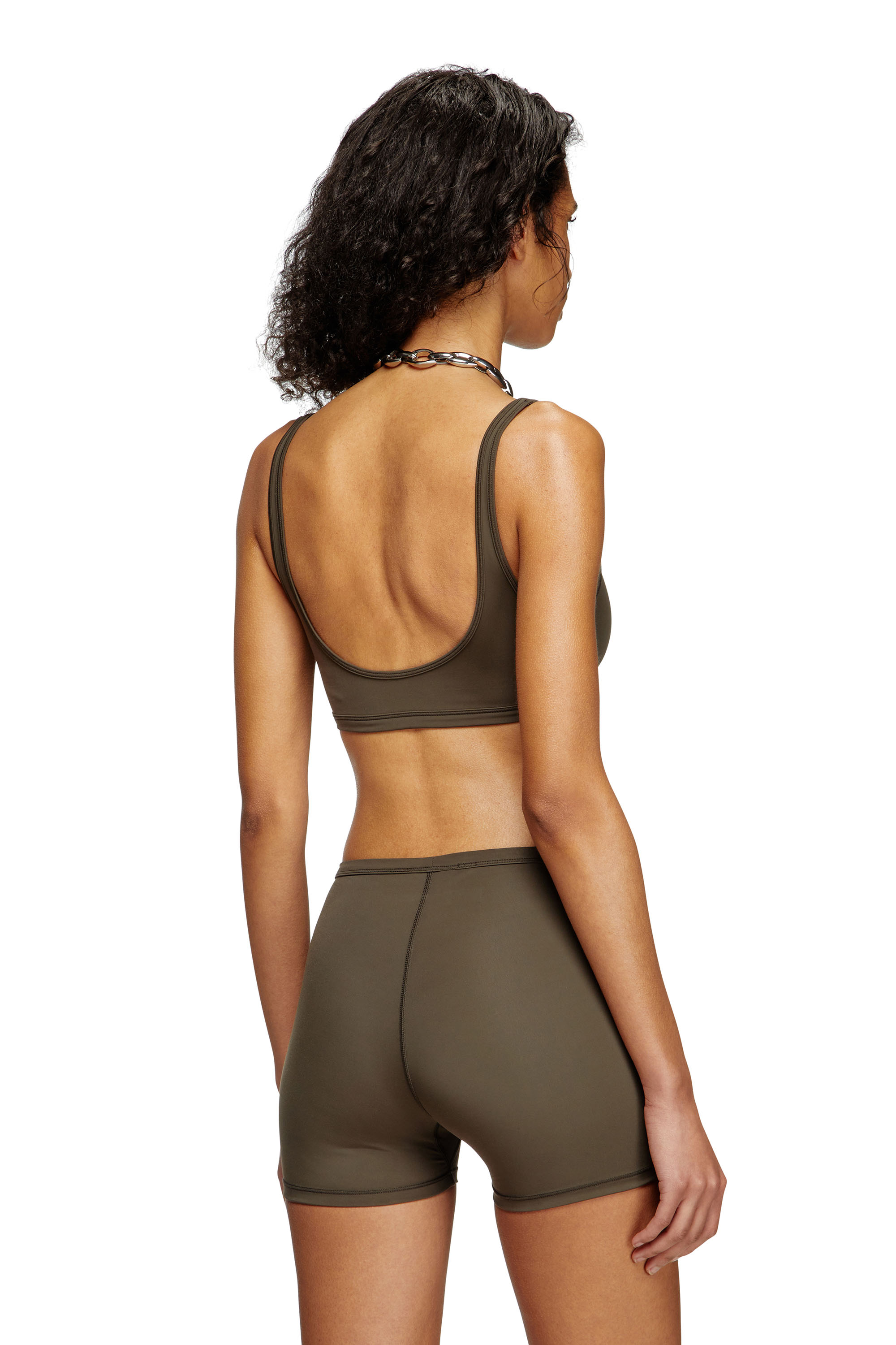 Diesel - CHELSEA-UTLT, Woman's Sports bra with cut-out logo in Brown - 4