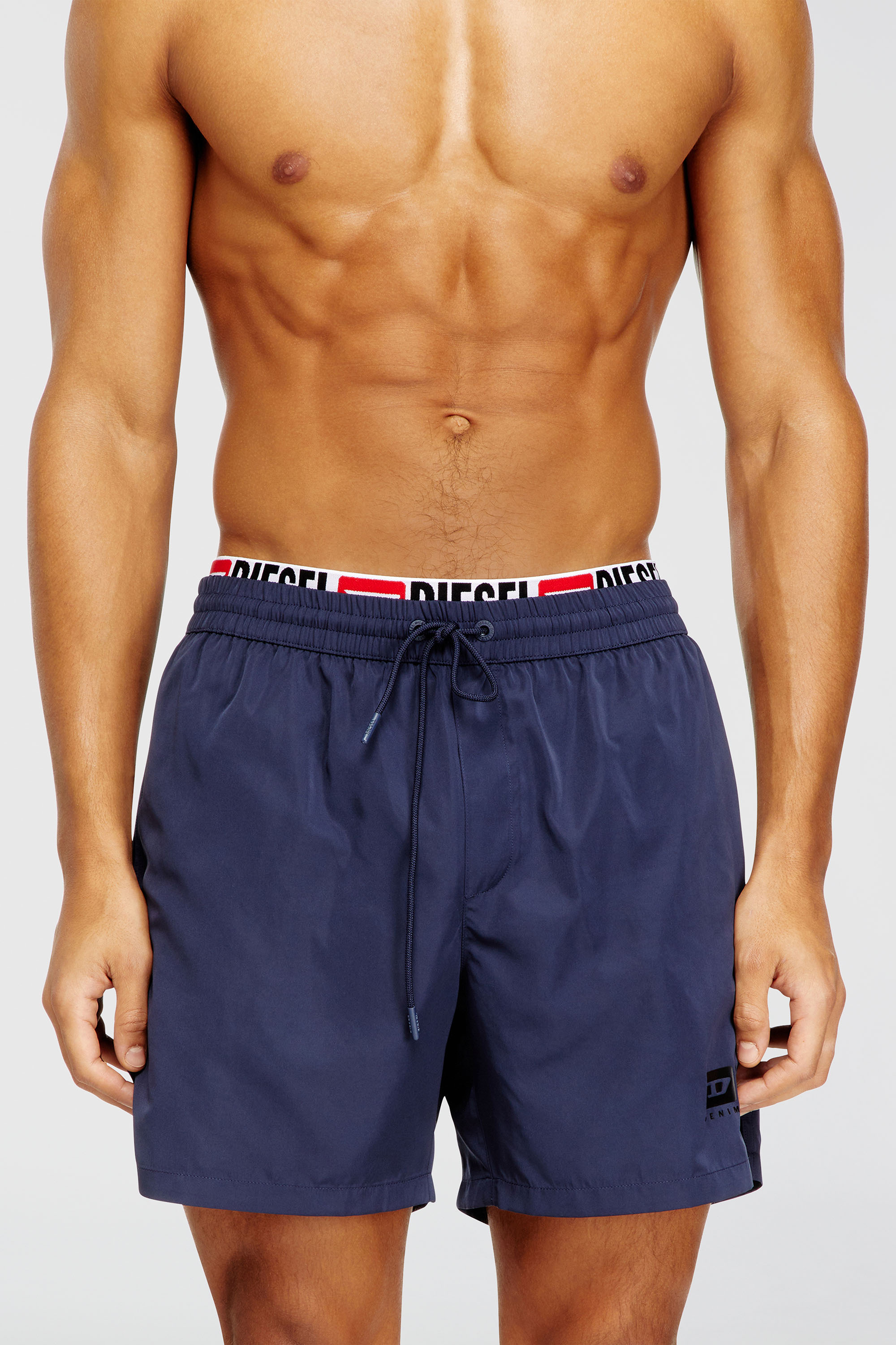 Mid-length swim shorts with logo print
