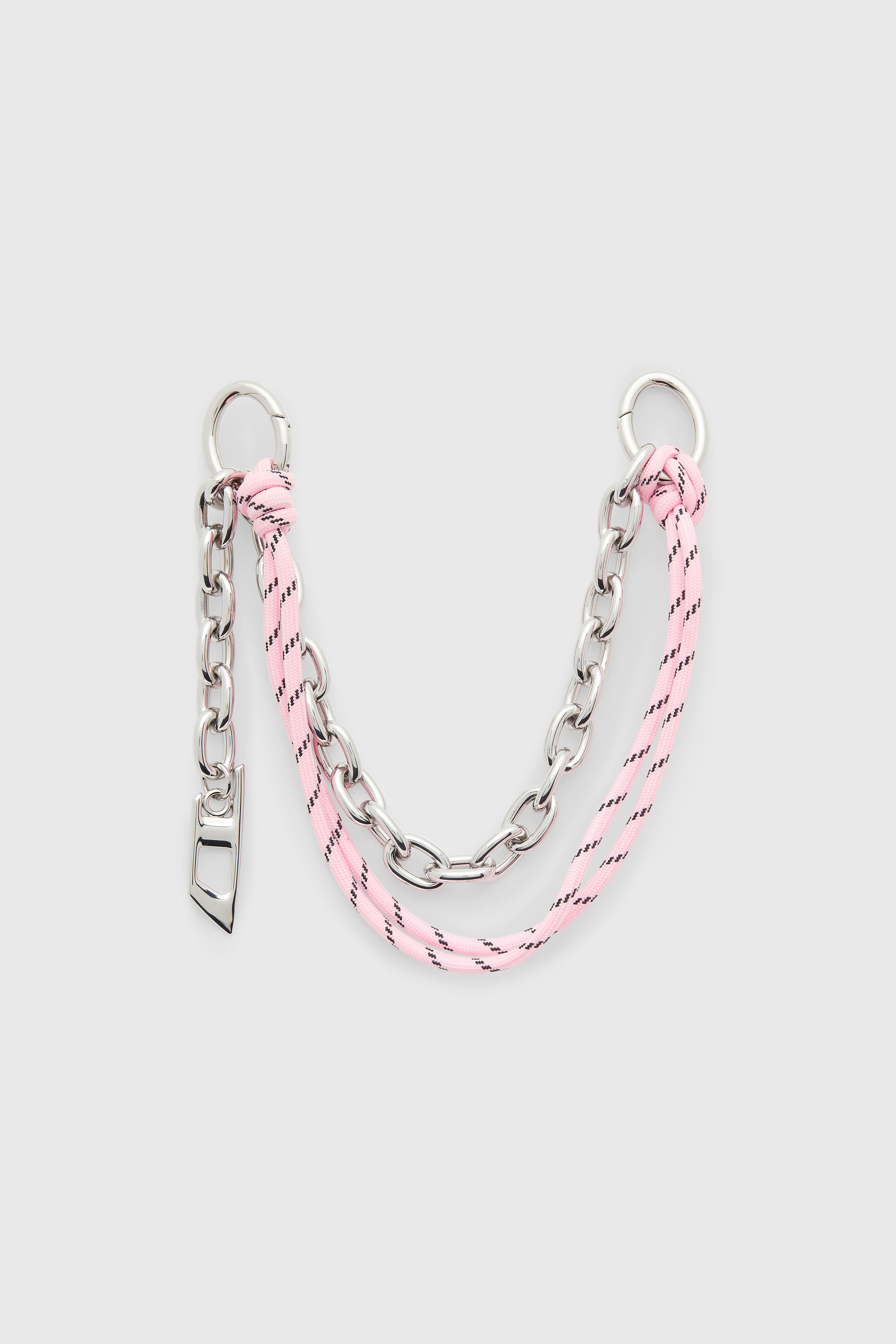 Metal charm with chain and rope detail